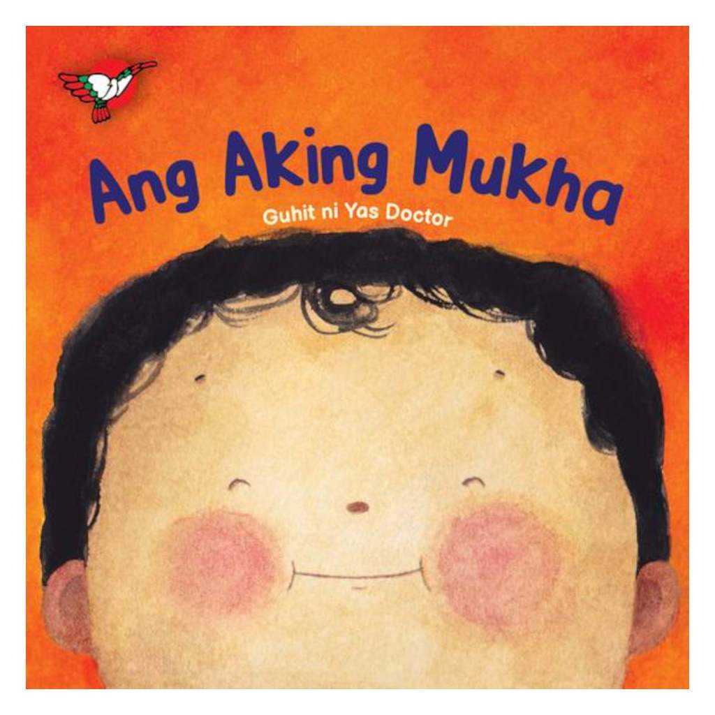 Cover of the board book 'Ang Aking Mukha' featuring a close-up illustration of a child's face with a bright orange background.